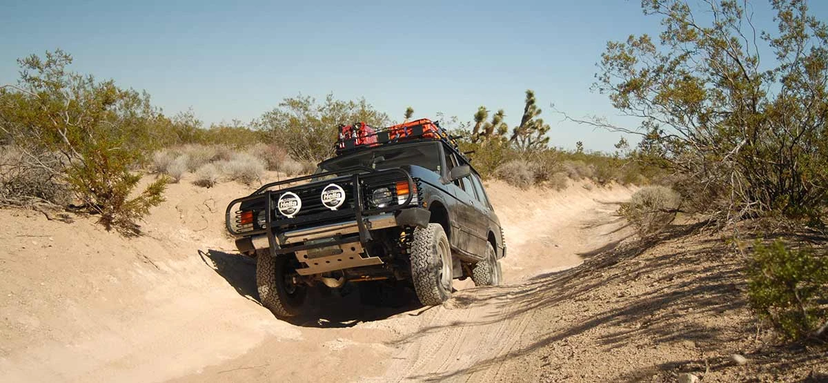 A Mitsubishi Pajero 4x4 conquering the Tahuya Trail